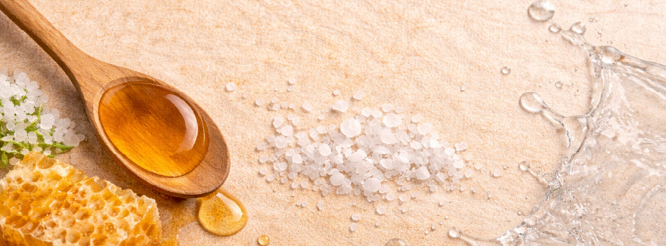 Natural carbohydrate and electrolyte ingredients used in energy gels arranged on a neutral background.